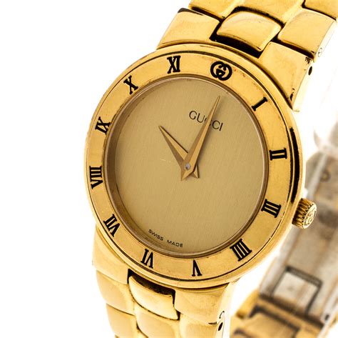 gold watch gucci